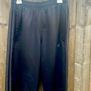 Black adidas pants gently used with black stripes